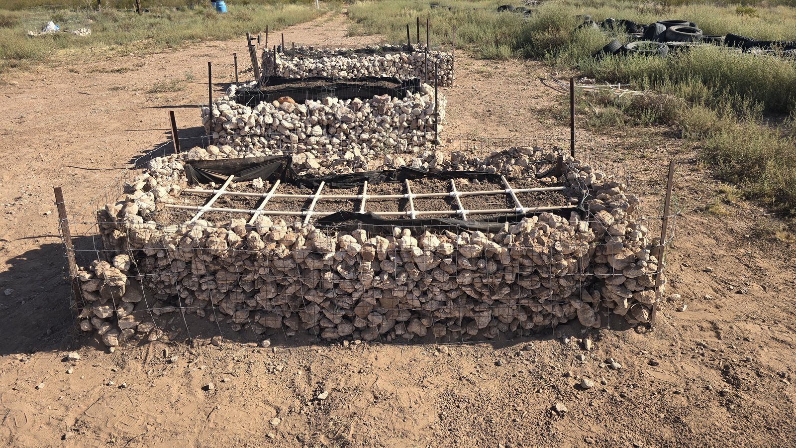 Gabion growing beds on the CompostHubOnline ranch in Cochise County, Arizona.